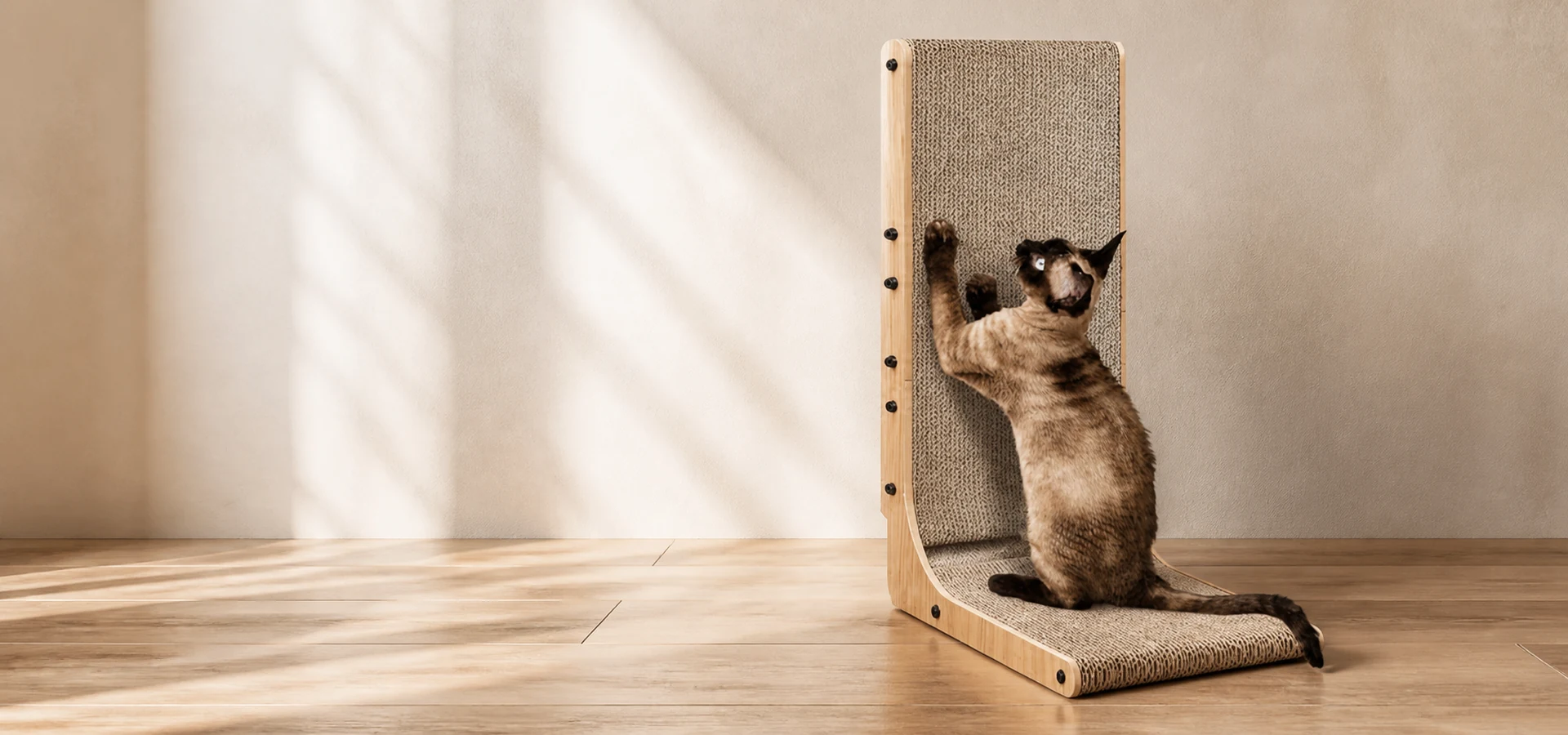 A cat using a natural wood L-shaped Kaimays cat scratcher