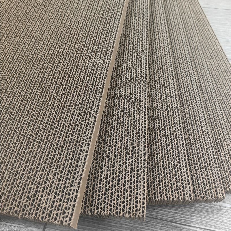 Close-up of dense corrugated cardboard layers for cat scratching boards